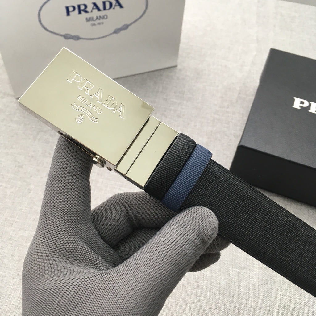 Dark belt with gold-tone Prada buckle and navy edge strip