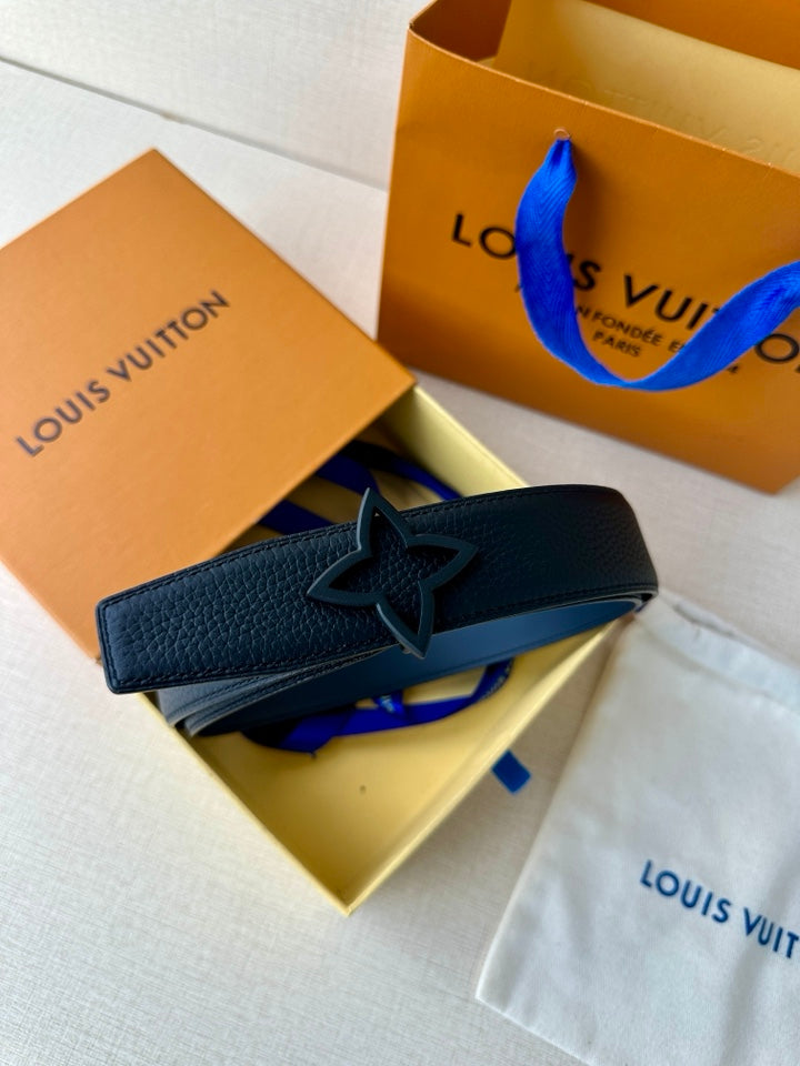 Louis Vuitton leather belt with dark blue strap and star buckle on box set