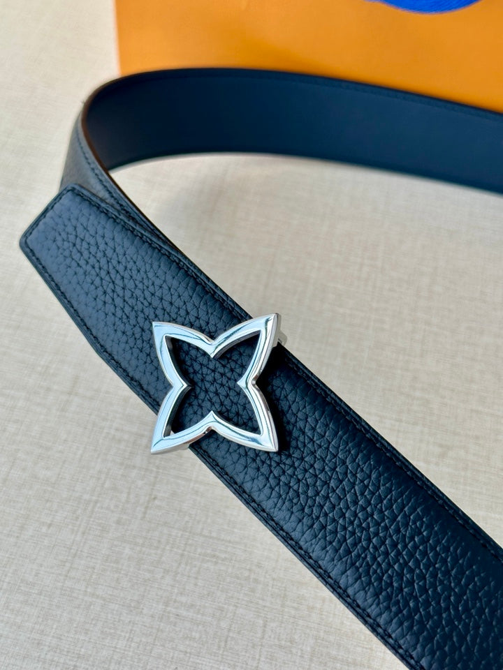 Louis Vuitton leather belt in dark blue with textured finish and star buckle