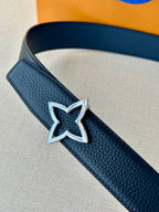 Louis Vuitton leather belt in dark blue with textured finish and star buckle
