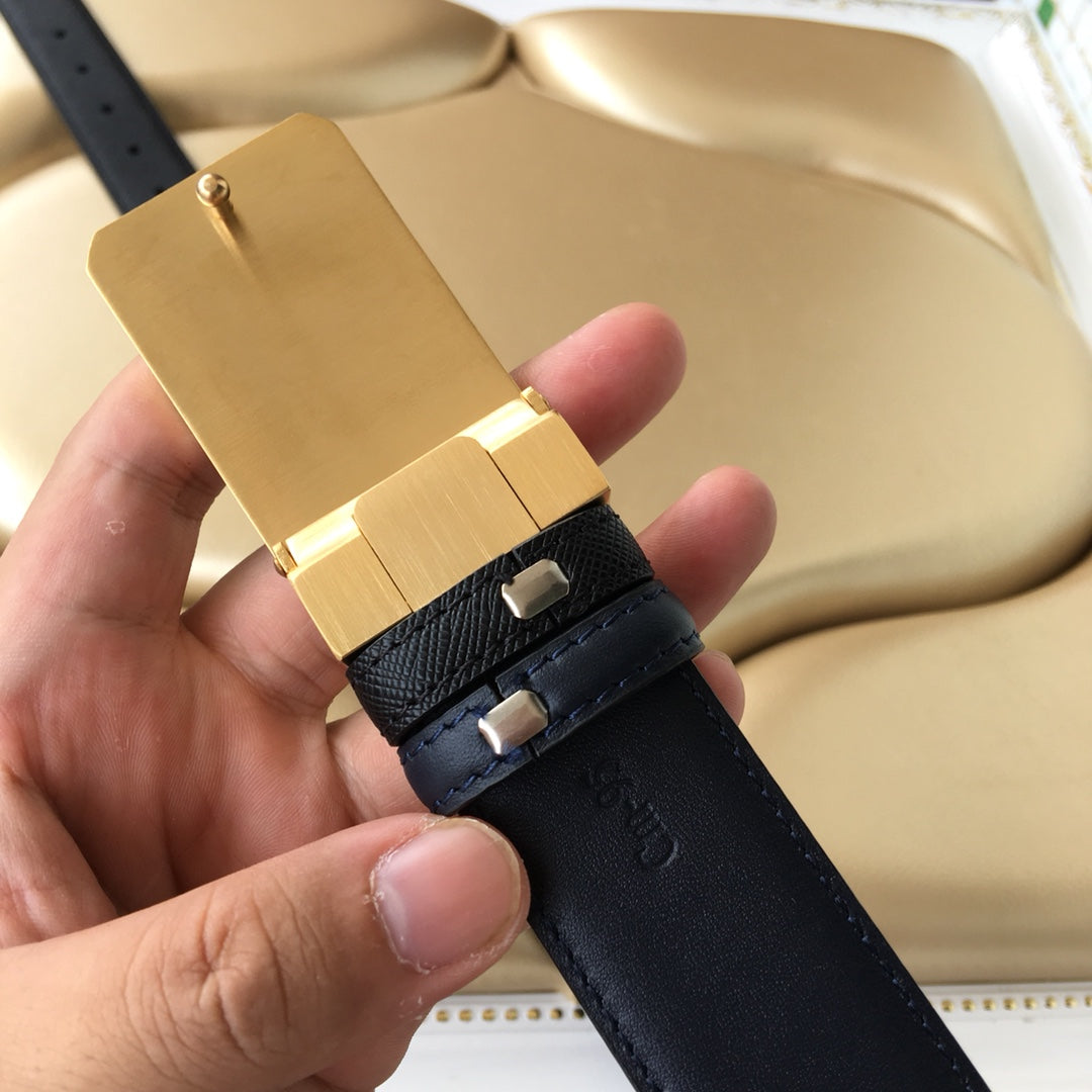 Prada leather belt buckle hardware view with black strap and gold-toned clasp