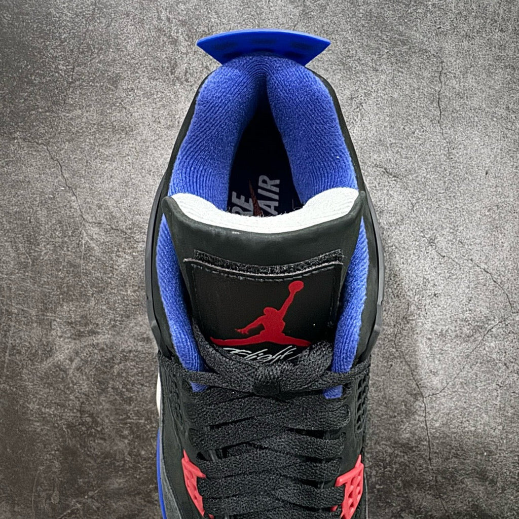 Black sneaker heel with blue lining and Air Jordan logo, featuring a red Jumpman mark