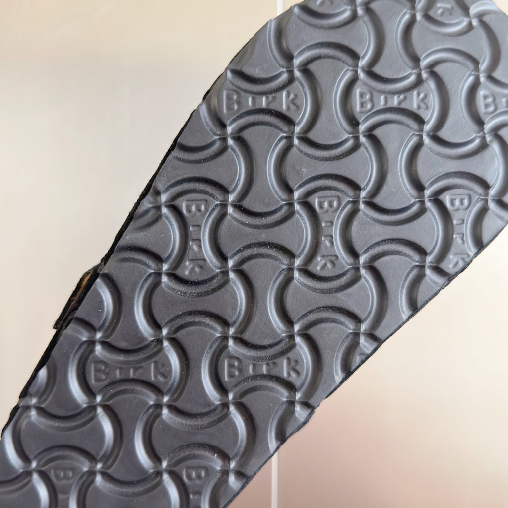 Louis Vuitton sandals outsole, dark textured tread with Birkenstock-style grip pattern