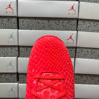 Red sneaker tongue and laces close-up with textured upper