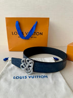 Louis Vuitton belt: dark blue embossed leather with silver-tone knot buckle