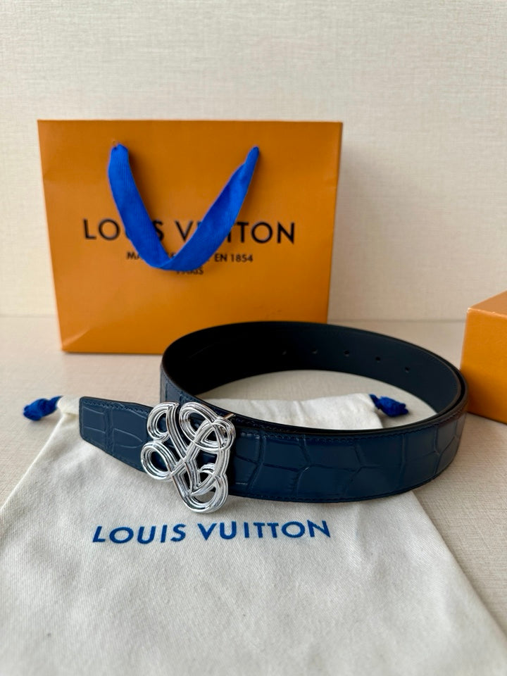 Louis Vuitton belt: dark blue embossed leather with silver-tone knot buckle