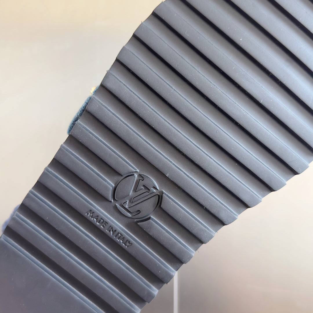 Louis Vuitton sandal outsole tread, textured rubber with embossed logo