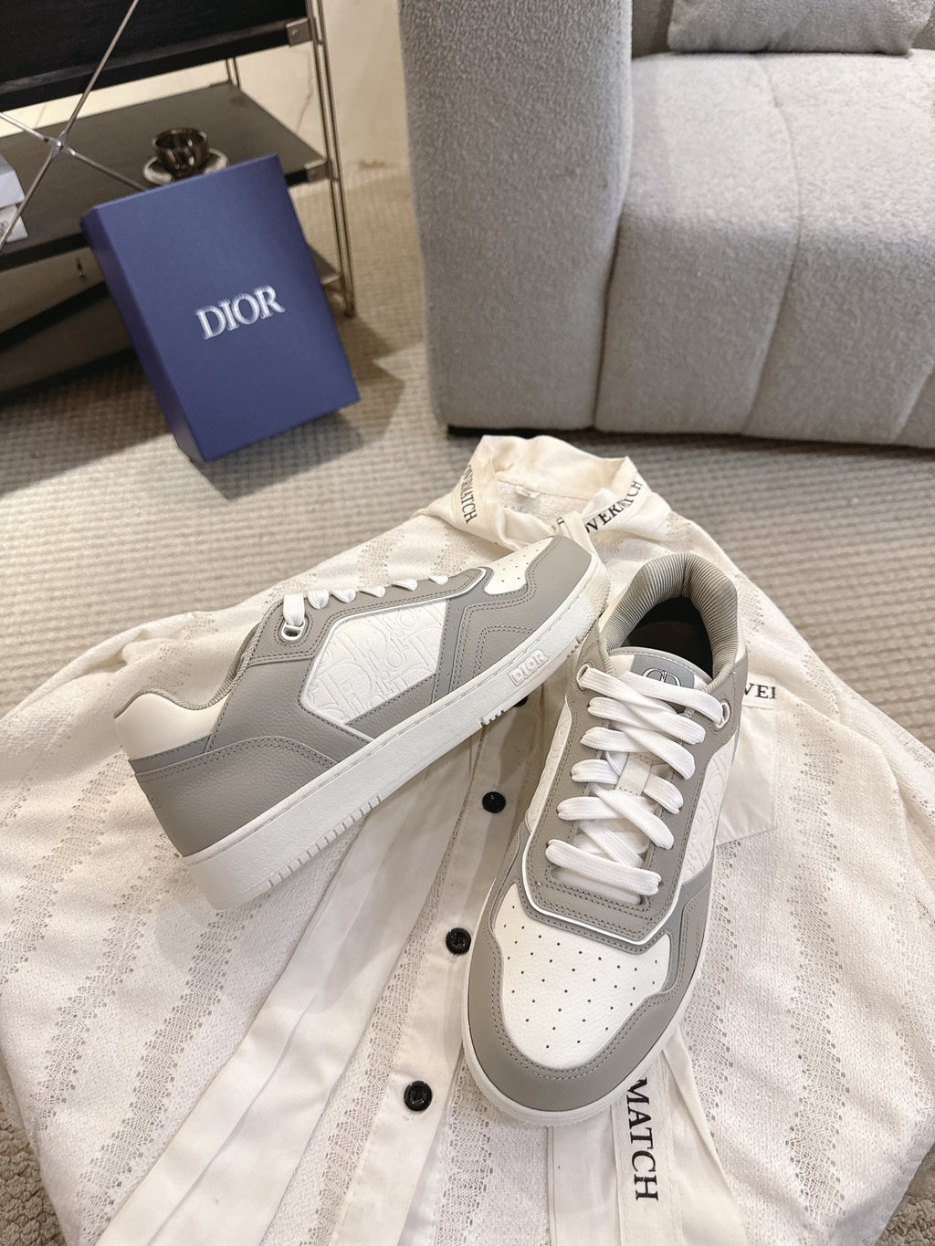 Unisex lace-up sneakers in white with light gray side panels and thick rubber sole