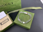 Silver chain bracelet with white leather tag and Gucci logo, with lobster clasp