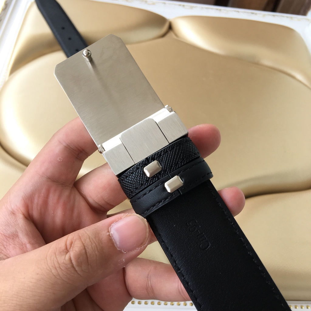 Black leather belt with silver-tone buckle and square keeper tabs