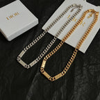Silver and gold chain necklaces with clasp and rectangular logo pendants