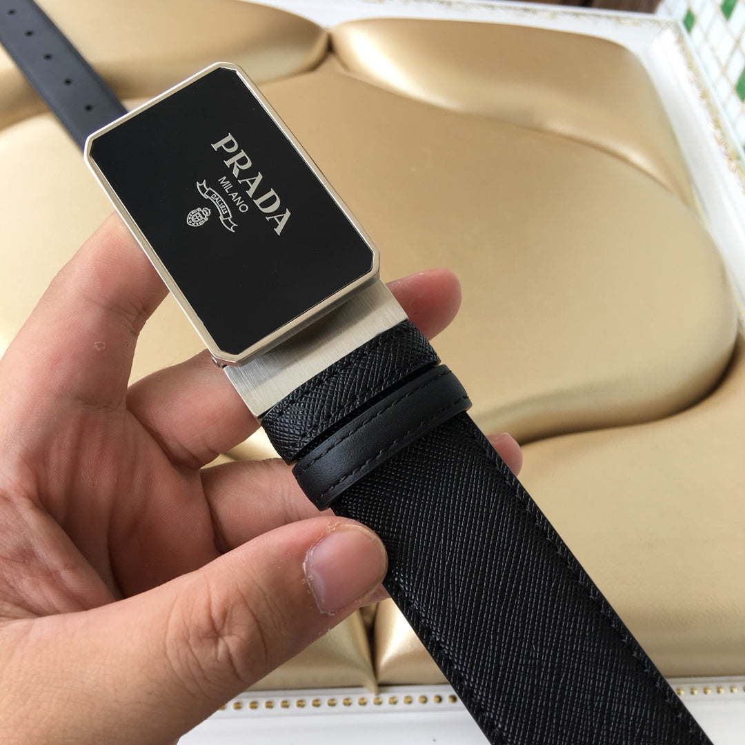 Black textured leather belt with Prada plaque buckle and topstitching