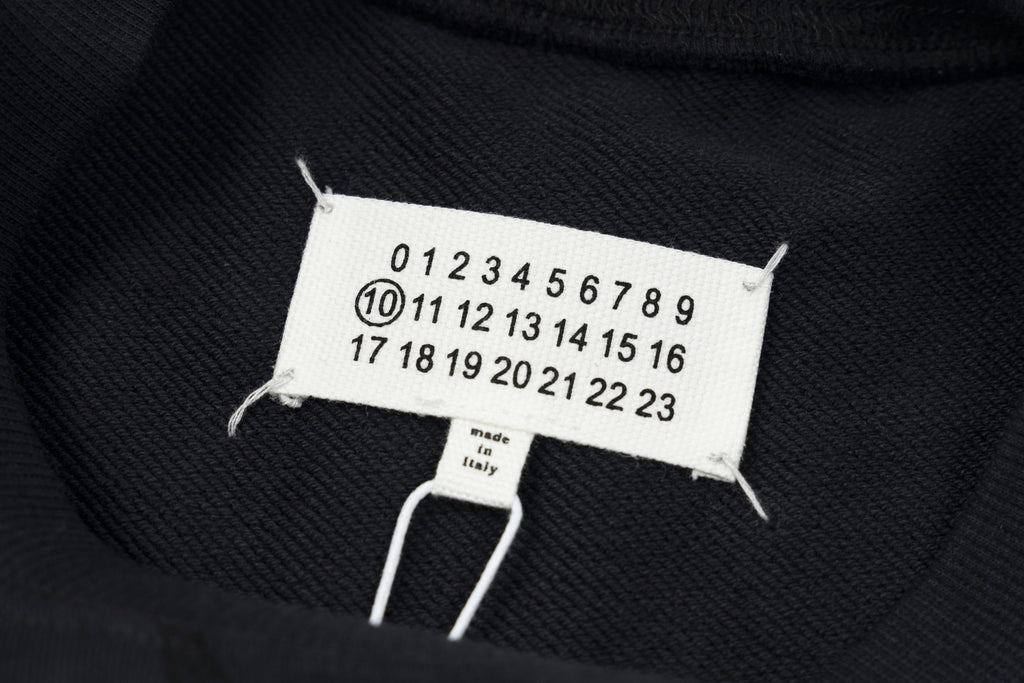 Navy crewneck sweatshirt neck tag with size numbers and Made in Italy
