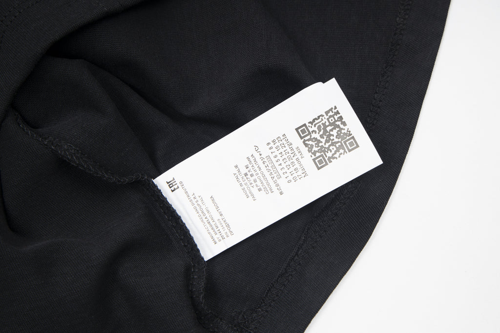Black Maison Margiela T-shirt with white fabric label and QR code