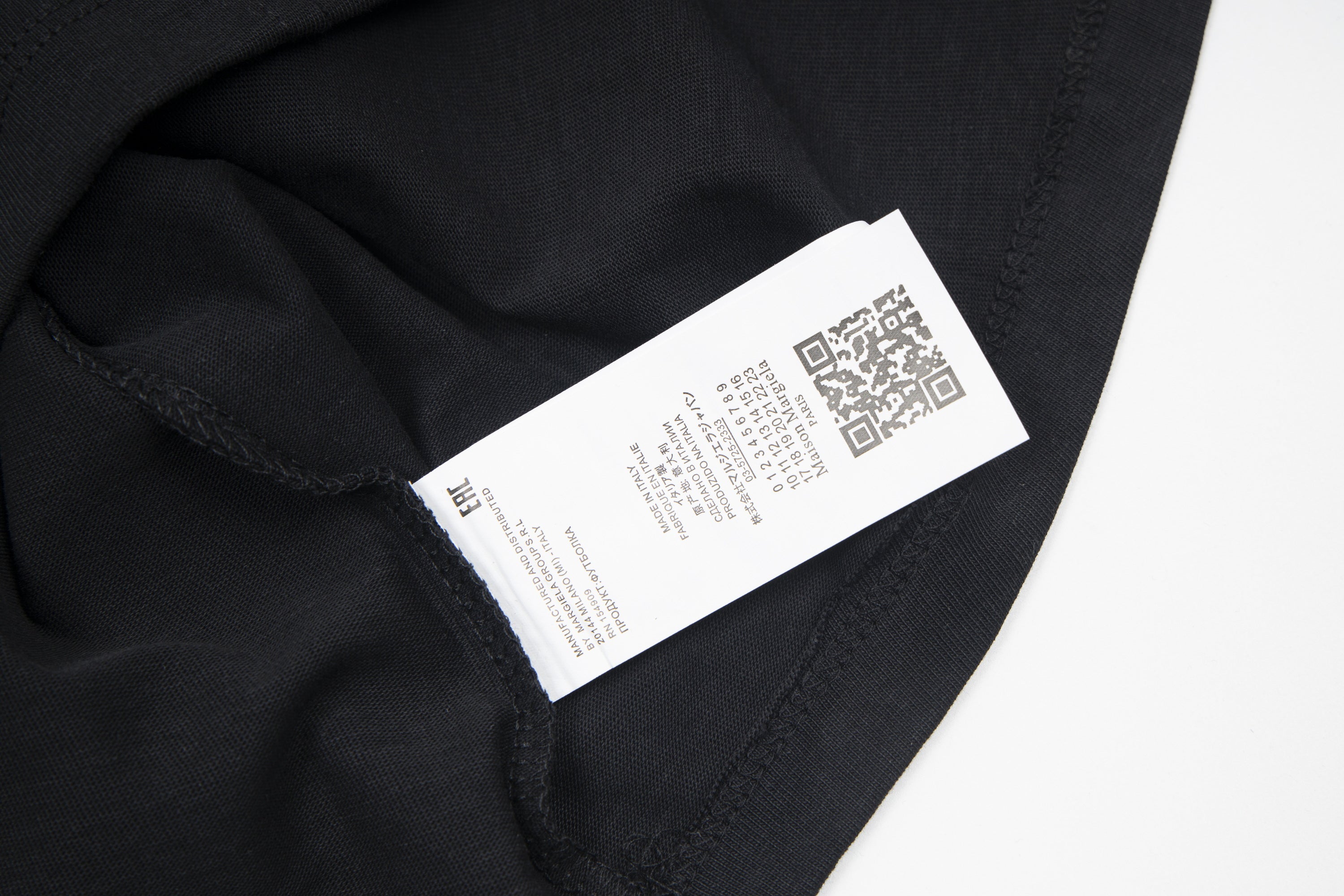Black Maison Margiela T-shirt with white fabric label and QR code