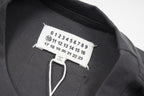 T-shirt interior size label close-up with numbered print