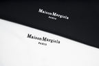 Black T-shirt fabric with Maison Margiela PARIS logo print