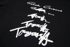 Dark hoodie with large white script logo graphic on chest