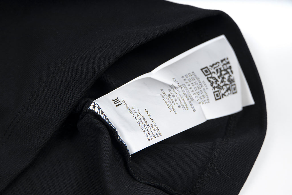 Black T-shirt neck label with QR code and brand tag
