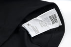 Black T-shirt neck label with QR code and brand tag