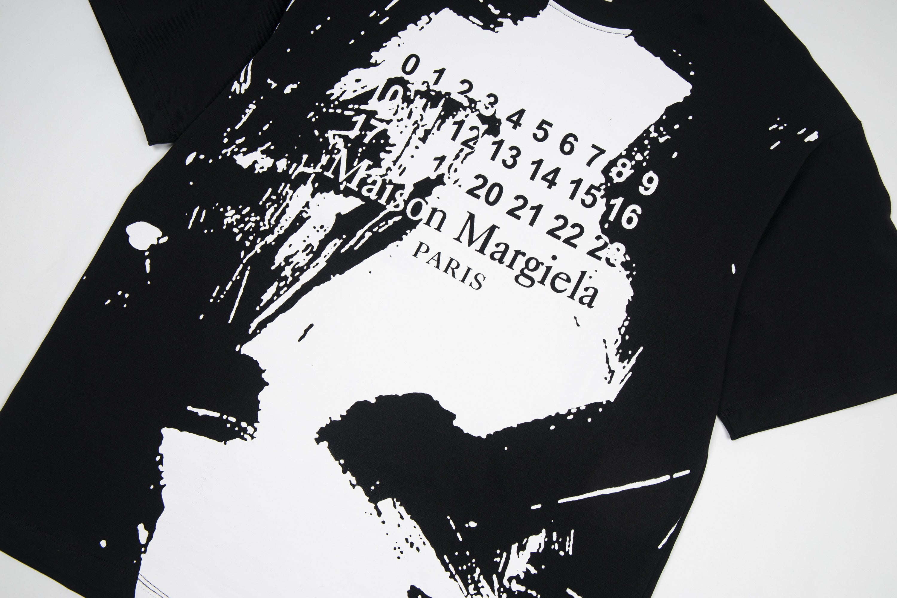 Maison Margiela black graphic T-shirt, close-up of front print