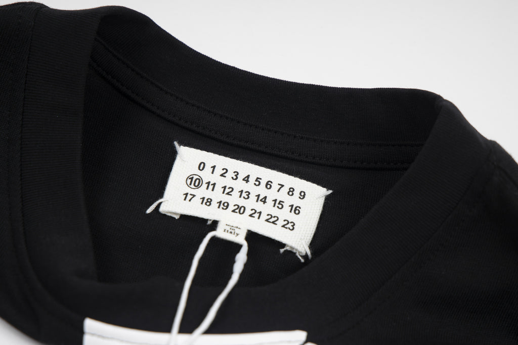 Maison Margiela black T-shirt neckline with size label tag