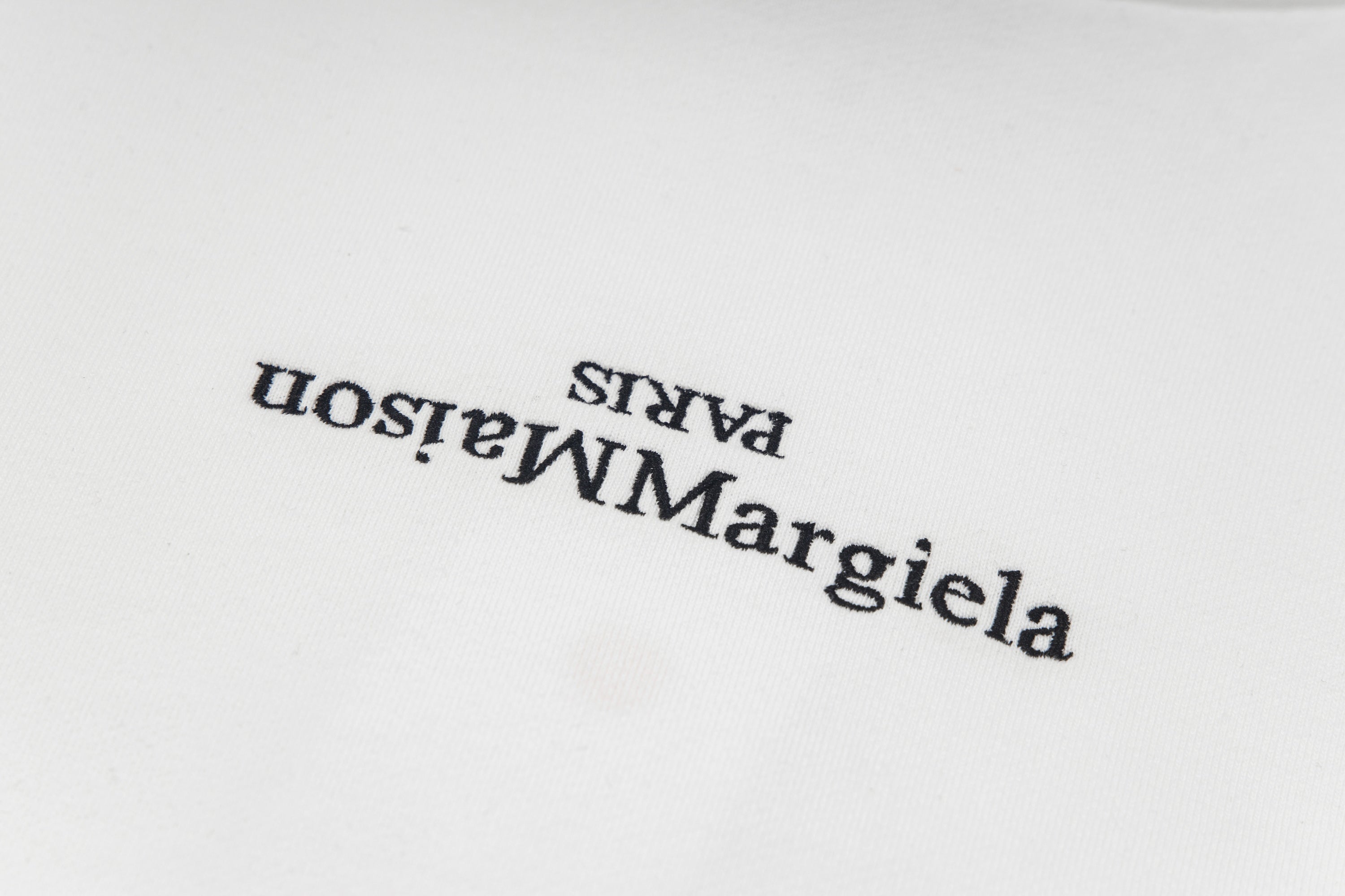 Hoodie logo print on white fabric