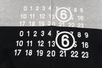 Hooded sweatshirt with number graphic on black and grey front panels