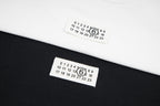 T-shirt size labels with numbered markings, two-tone set