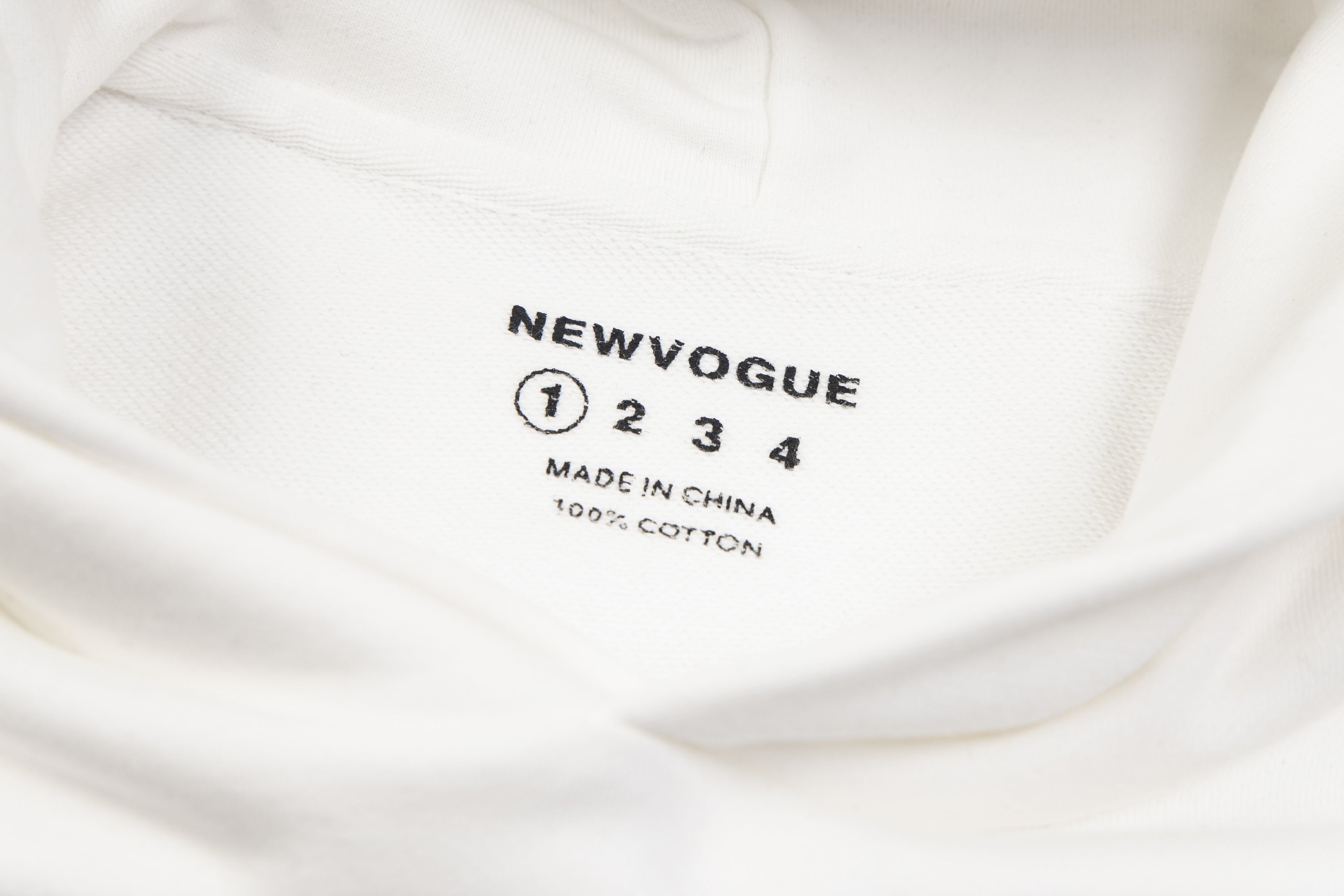 White hoodie interior label print: NEWWOGUE, Made in China, 100% cotton