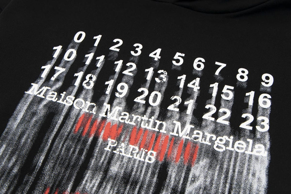 Black hoodie graphic with numeric chart, red and gray streaks, Maison Martin Margiela