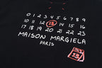 Black crewneck sweatshirt back graphic with numbers, 'MAISON MARGIELA PARIS' patch