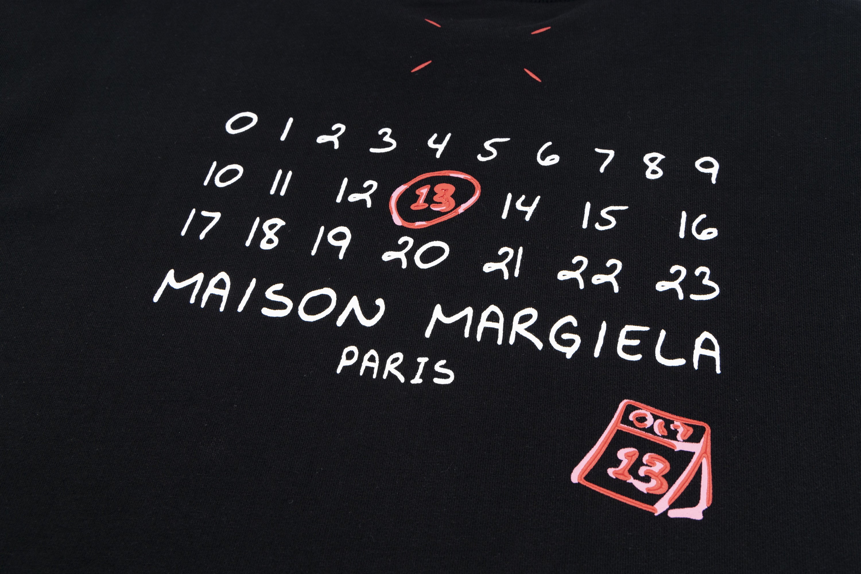 Black crewneck sweatshirt back graphic with numbers, 'MAISON MARGIELA PARIS' patch