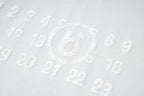 Maison Margiela white T-shirt fabric with raised number-like logo print