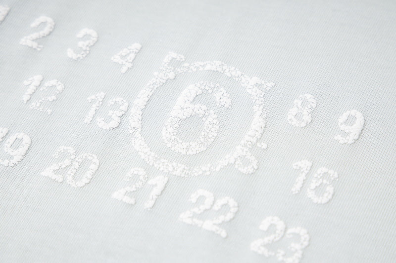 Maison Margiela white T-shirt fabric with raised number-like logo print
