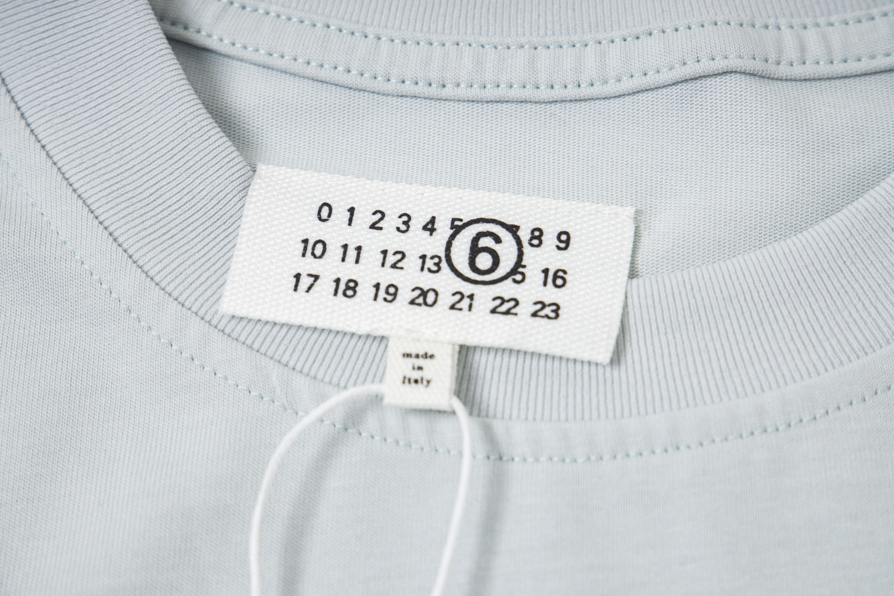 Maison Margiela T-shirt neck label with size numbers and logo