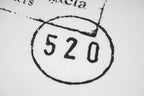 Close-up of 520 stamp on T-shirt logo patch