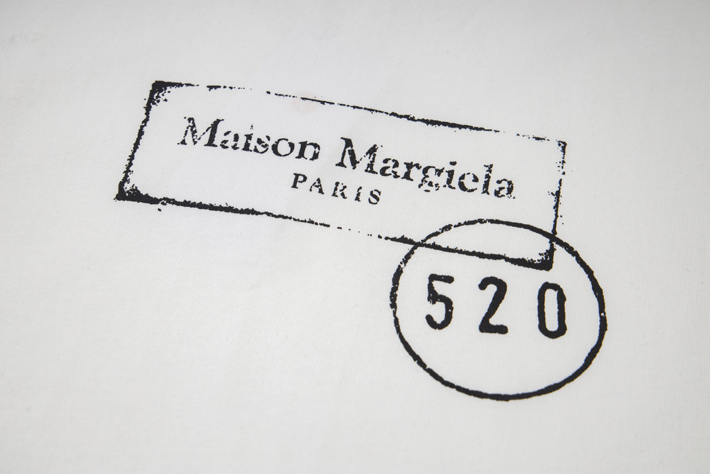 Close-up of Maison Mar giela stamp and 520 circle on T-shirt print