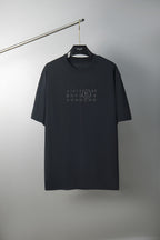 Maison Margiela dark crew-neck T-shirt with small chest logo graphic