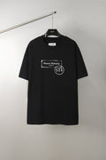 Black crew-neck T-shirt with Maison Margiela 520 logo print