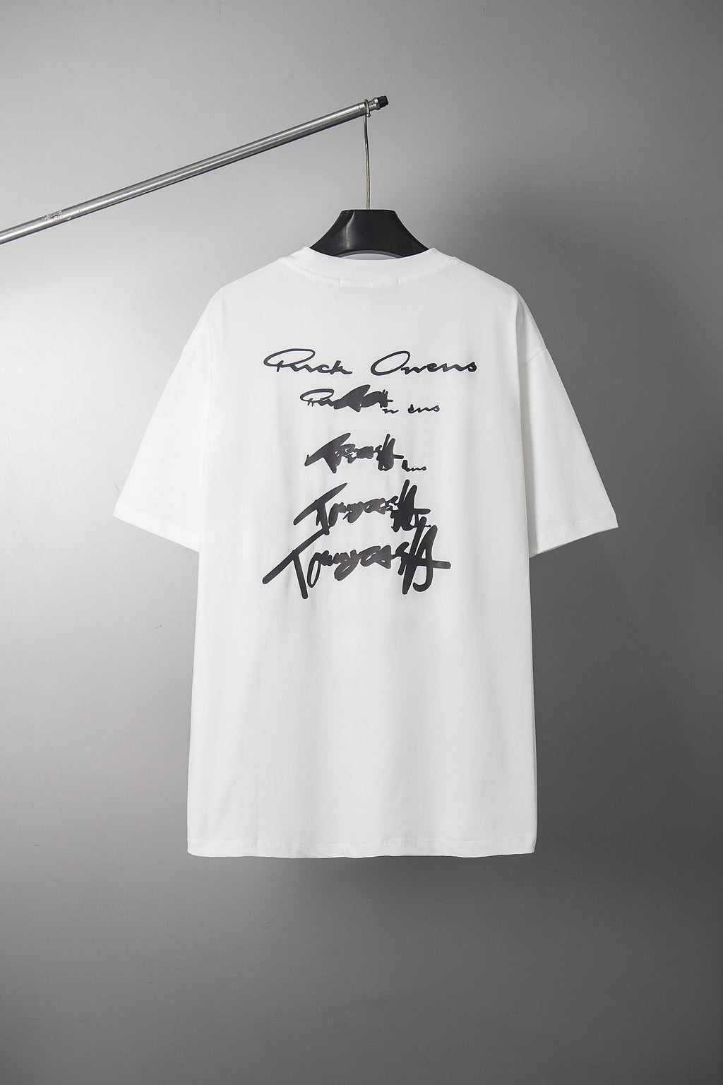 White crewneck T-shirt with signature-style graphic print at chest