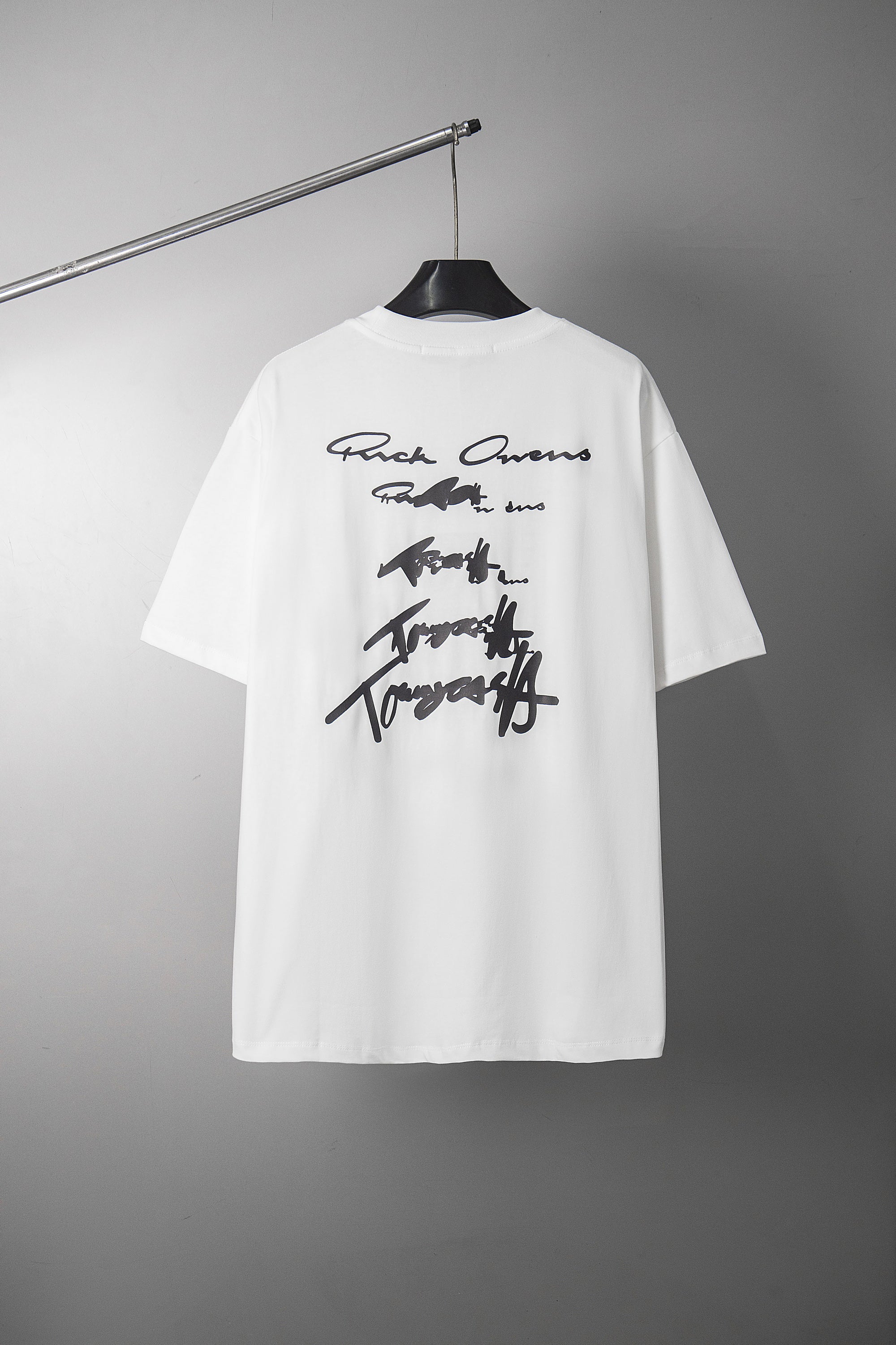 White crewneck T-shirt with signature-style graphic print at chest