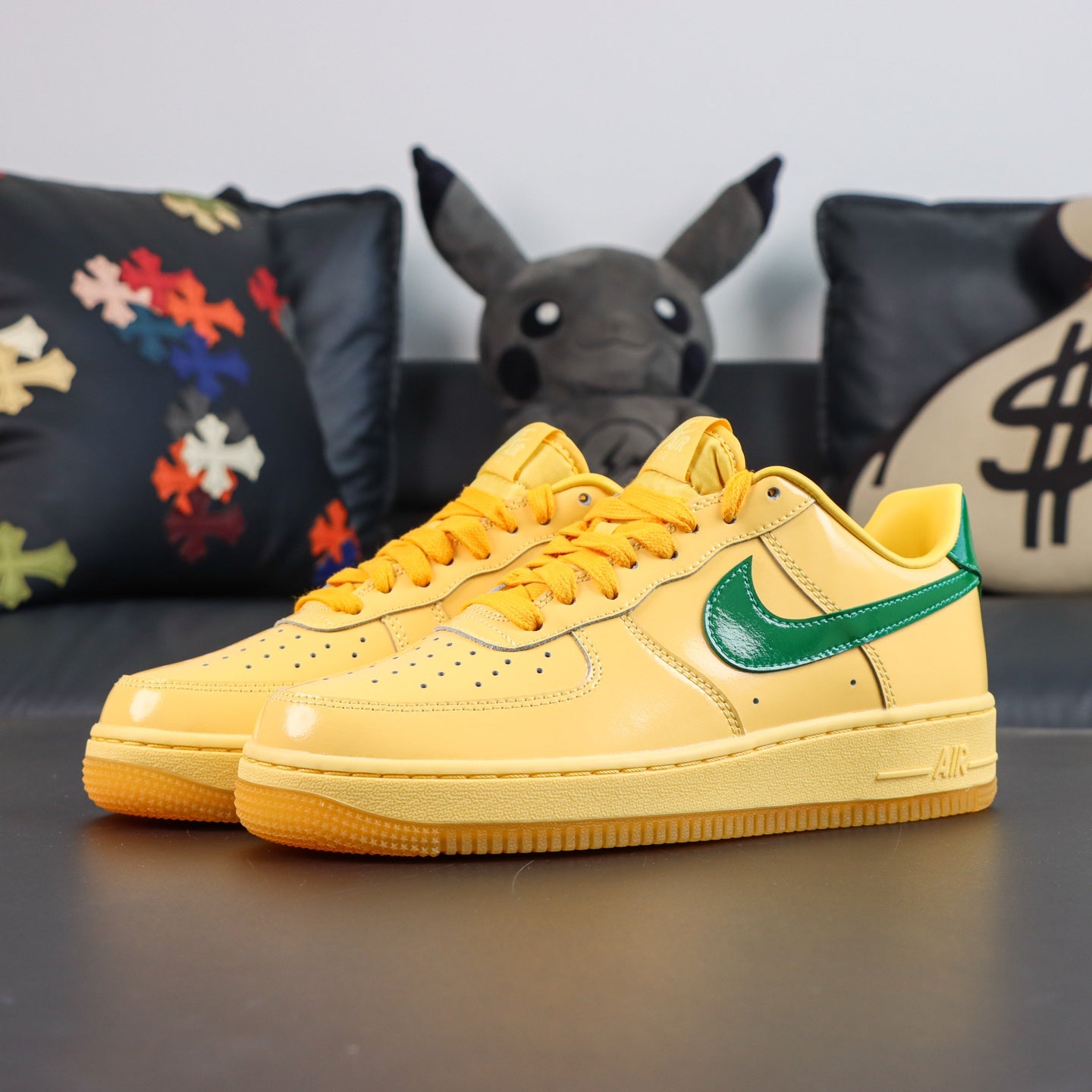 Nike Air Force 1 sneakers, glossy yellow finish with green swoosh and gum sole