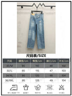 Light blue denim wide-leg jeans with waistband; size chart panel shown