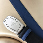 Navy fabric belt with silver studded Prada buckle, blue and black strap layers