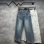 Denim pants on hangers: light blue and white styles with belt loops