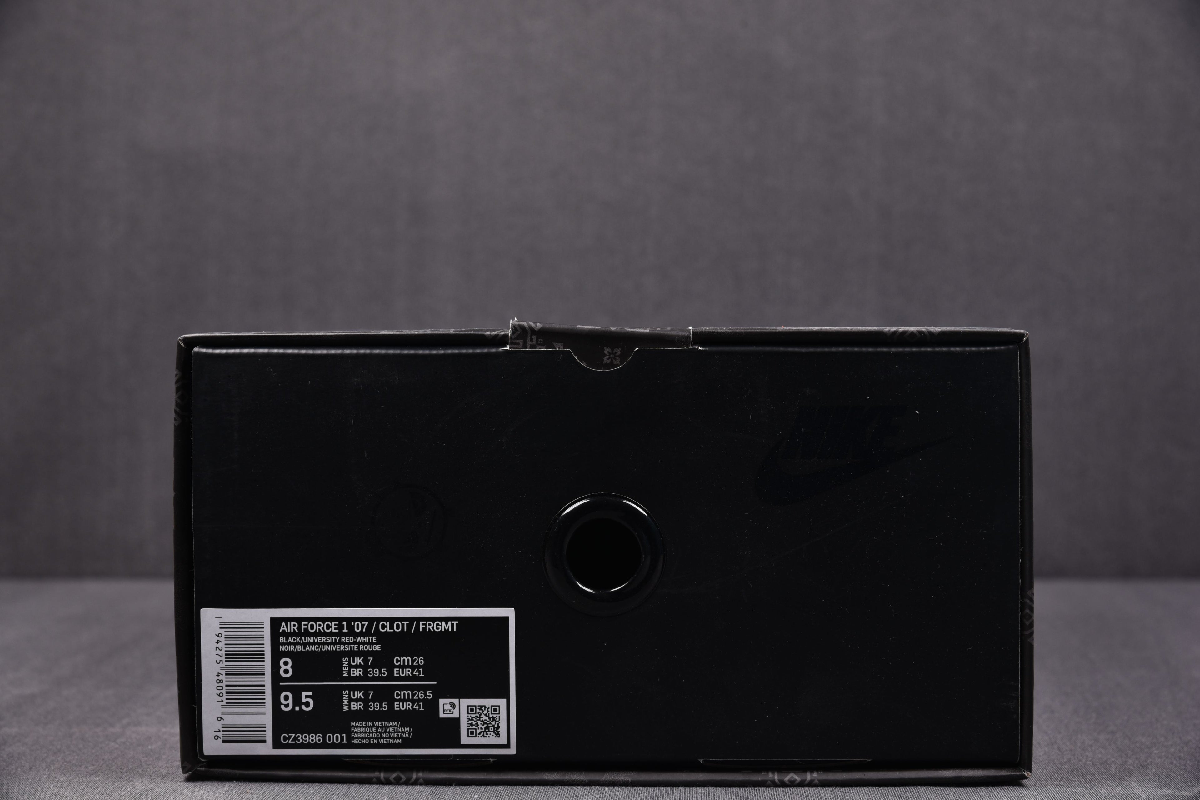 Black sneaker shoebox with size label sticker