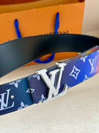Blue patterned belt with silver buckle detail and interlocking LV letters