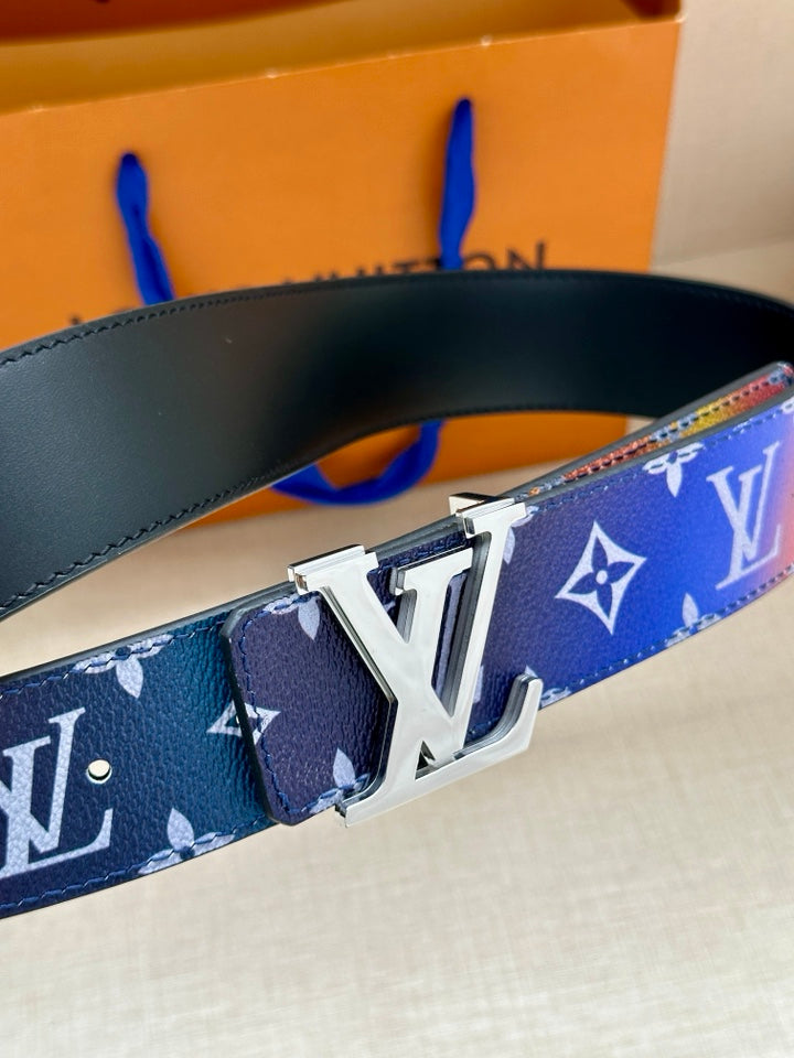 Blue patterned belt with silver buckle detail and interlocking LV letters