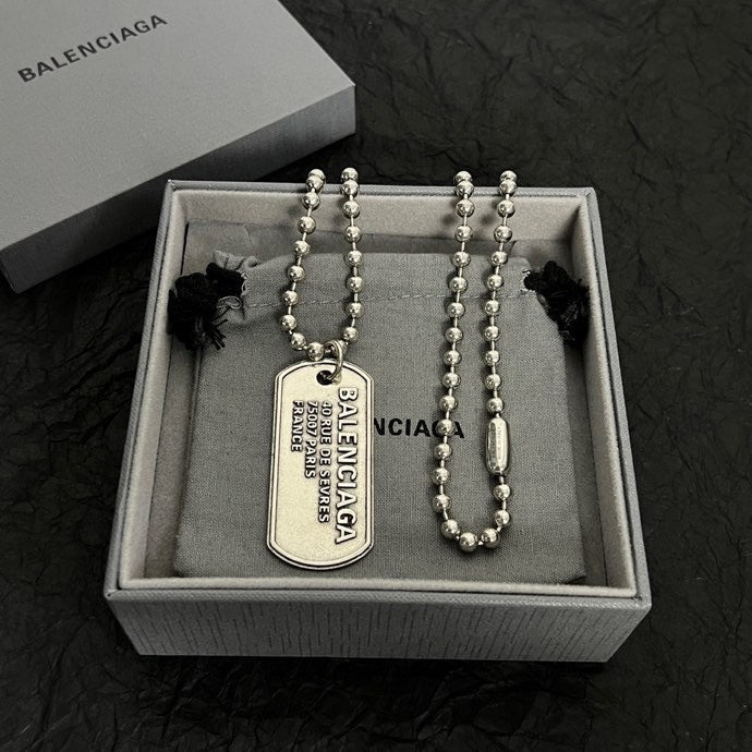 Silver-tone bead necklace with dog tag pendant in presentation box